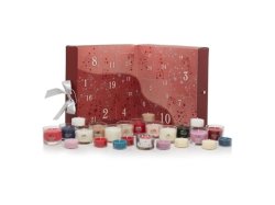 YANKEE CANDLE dárková sada Adventní kalendář kniha, 12 ks votivních svíček ve skle + 12 ks čajových svíčkek + svícen